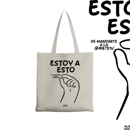 Tote bag Estoy a esto de mandarte a la